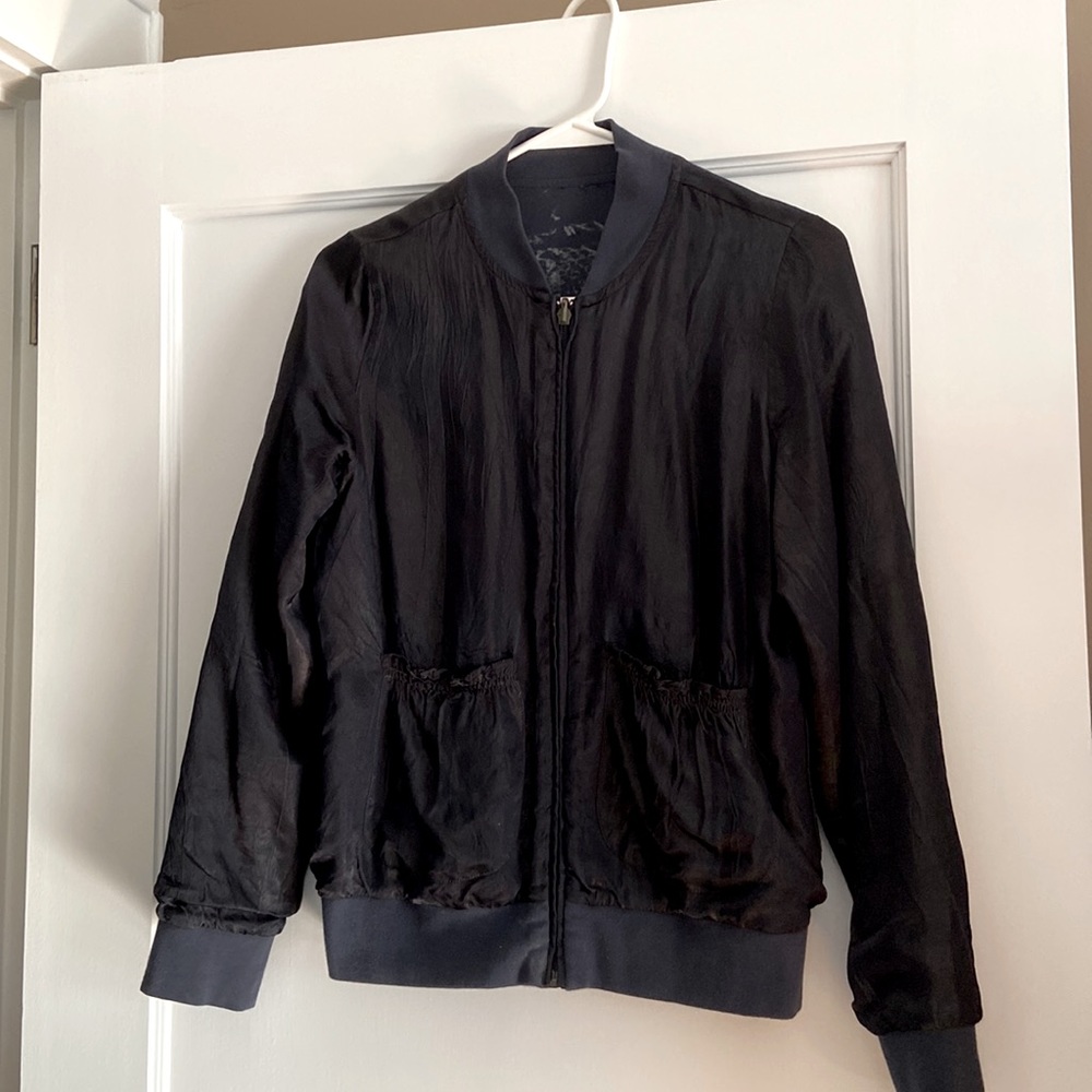 Hugo Boss reversible jacket. Silky side, light flannel air with emblem.